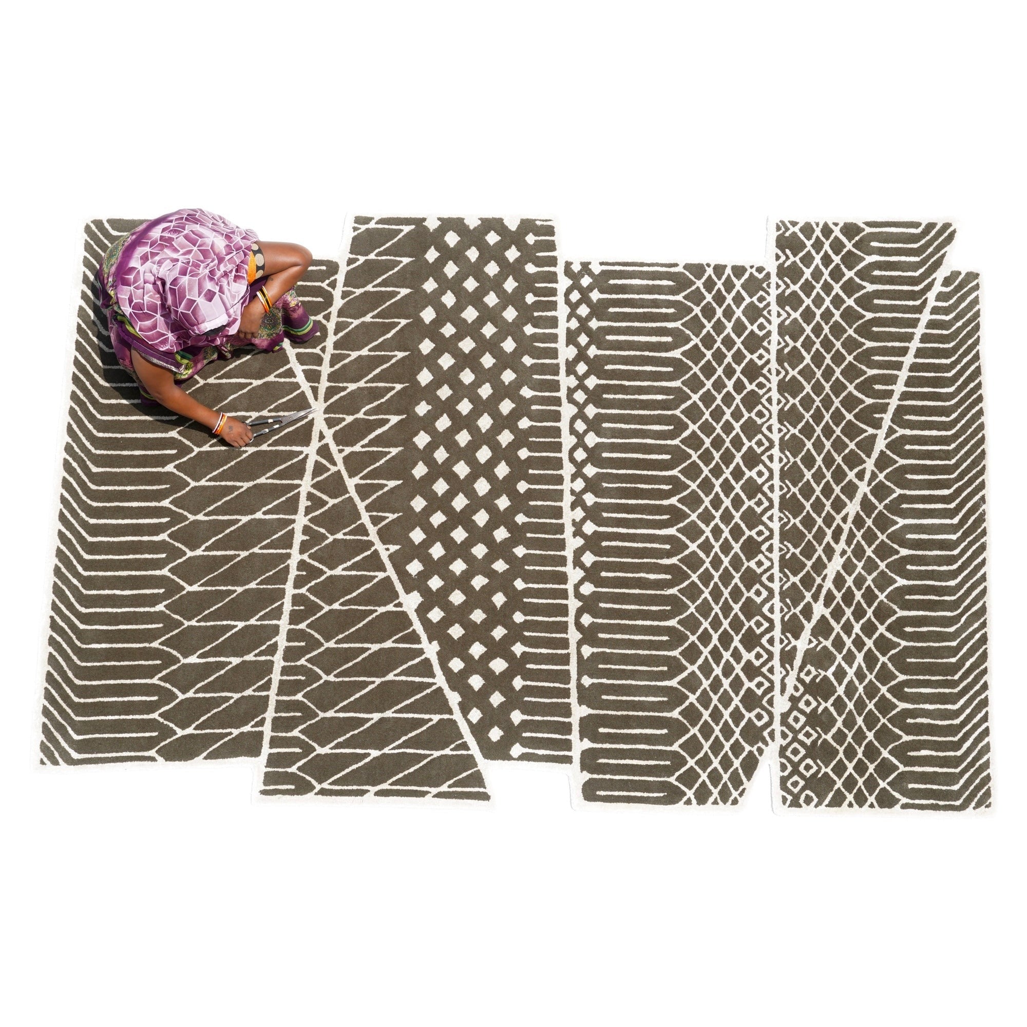 The rich-looking Paradox rug transforms your space into a high drama realm that is at once light-hearted and profound. The pure, natural New Zealand wool with an underlying gleam of Jasmine silk gives it a luxurious feel that keeps you rooted. The Paradox’s 3D cut-out and visually striking B&W criss-cross pattern is both playful and flamboyant. It’s striking geometric design makes a style statement in any space, when draped on a wall or on the floor.
