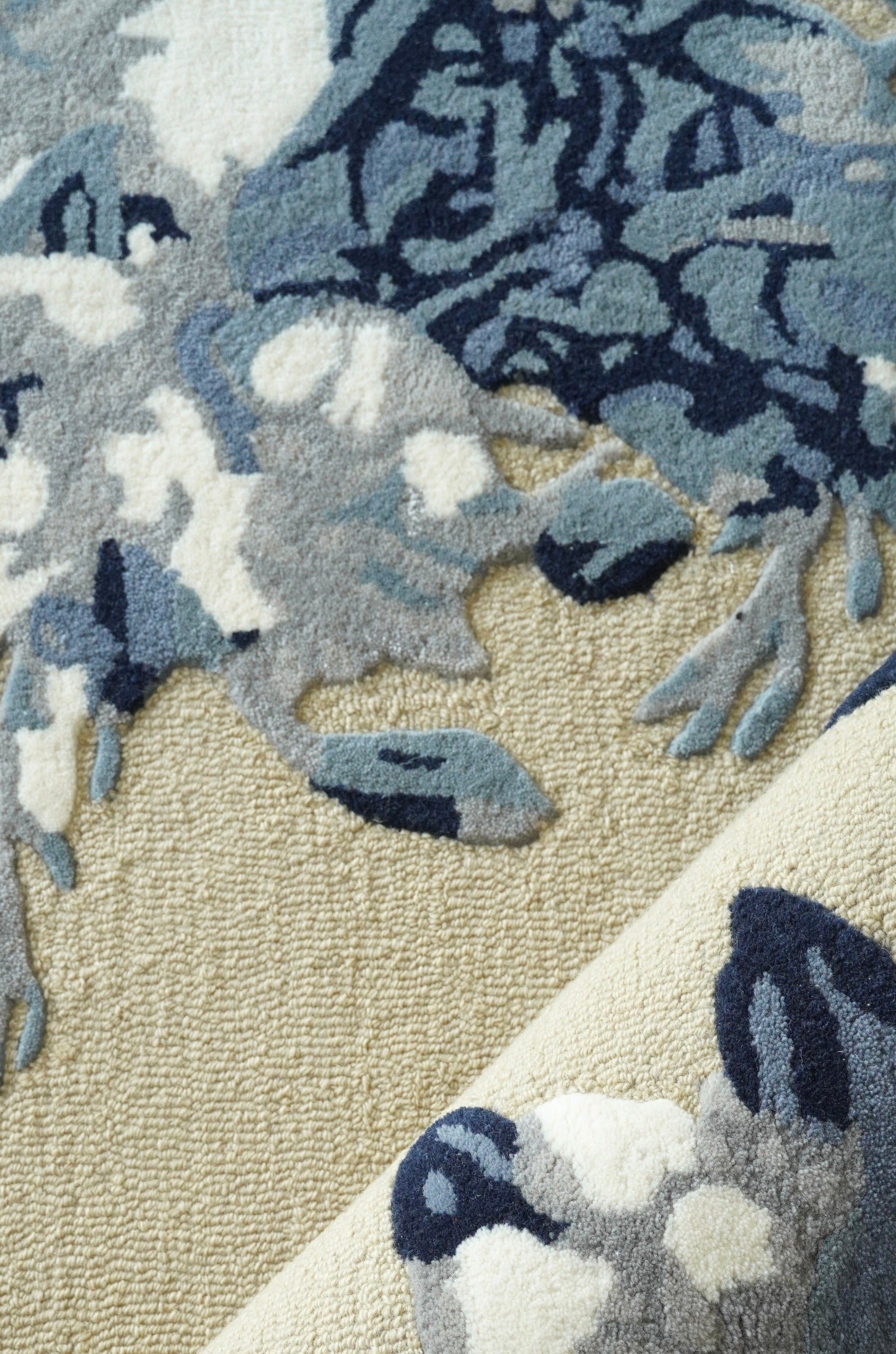 Create an alfresco sensory experience indoors with the luxurious Indigo Perennials’ lush blue blooms at your feet. The textured softness of the hand tufted New Zealand wool, woven with the silkiness of Jasmine silk, enhances the English garden inspired design. Combining the best of blue and purple hues, the indigo flowers in a 3D cut-out embody the beauty and complexity of floral architecture. The Indigo Perennials is once in a blue moon décor choice, perfect for any living space!